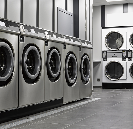 Room with stacked dryer machines